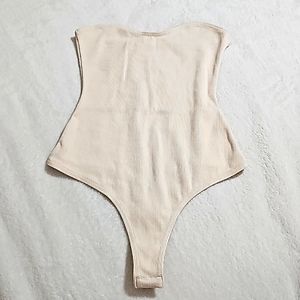 Brand new cream bodysuit